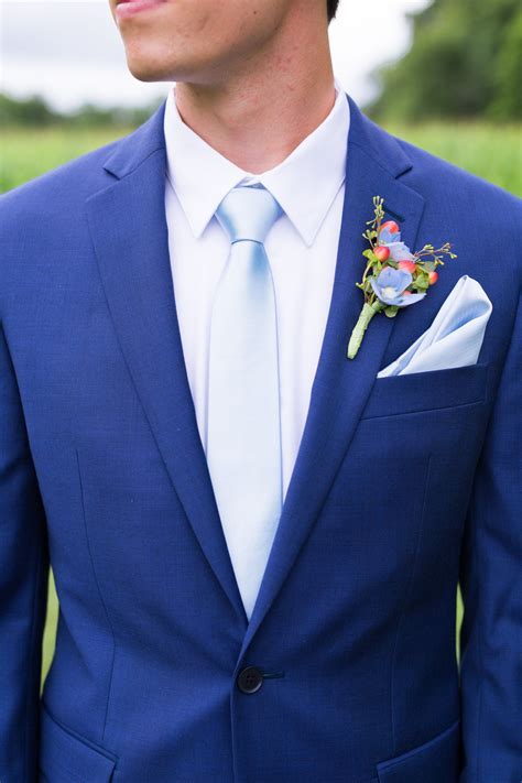 navy suit light blue tie|floral ties with navy suit.